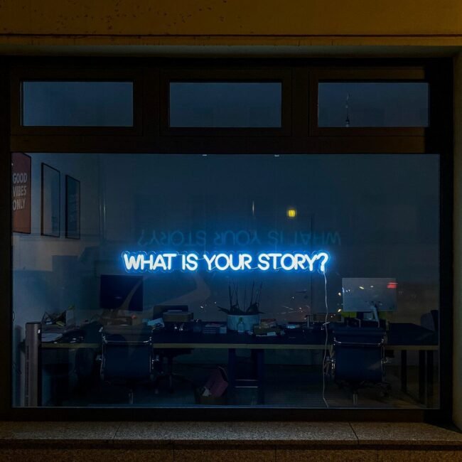 black flat screen tv turned on at the living room